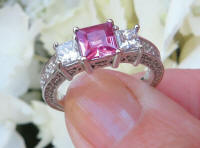 Ornate Natural Princess Cut Pink Sapphire Engagement Ring with Real Princess Diamonds  in a detailed 14k white gold band for sale