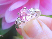 Expensive Natural Peachy Pink Sapphire Three Stone Engagement Ring in 14k white gold for sale
