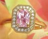 Pink sapphire ring with radiant cut Ceylon sapphire and diamonds in 14k rose gold setting.