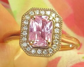 Pink sapphire ring with radiant cut Ceylon sapphire and diamonds in 14k rose gold setting.
