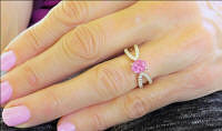 Natural pink sapphire ring in split shank diamond setting in 14k rose gold