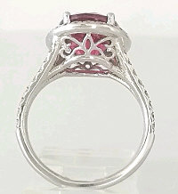 Halo round nigerian pink tourmaline ring in 14k white gold