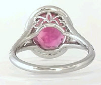 Halo round nigerian pink tourmaline ring in 14k white gold