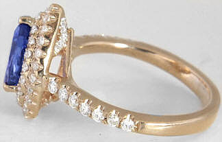 Diamond Halo Tanzanite Rings in 18k in gold