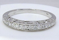 Heart-shaped natural ruby engagement ring in 14k white gold with vintage design and diamond accents.
