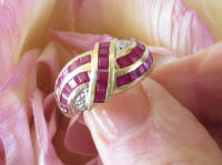 Natural Channel Set Ruby Swirl Fashion Ring in solid 14k yellow gold for sale