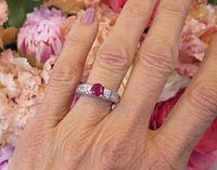 A stunning Burmese ruby and diamond ring in 14k white gold with vintage details and sparkling diamonds.