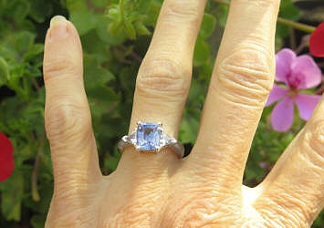  Natural Blue Sapphire and Trillion White Sapphire Three Stone Engagement Ring in 14k white gold