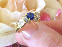 Damiani Natural Round Blue Sapphire Engagement Ring with Baguette Diamonds in solid 18k Yellow Gold for sale