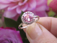 Real peachy pink round sapphire engagment ring with real diamond halo in 14k white gold