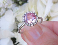 Natural round peachy pink sapphire engagment ring with real diamond halo in white gold for sale