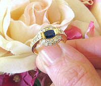 Natural Oval Sapphire Fashion Ring with East West Set Sapphire and Pave Diamond Band in solid 14k yellow gold for sale