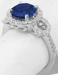 Round Blue Sapphire and Diamond Halo Rings in 14k white gold
