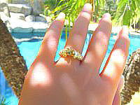 A stunning 14k yellow gold ring with baguette and pave diamonds, exuding elegance and glamour.