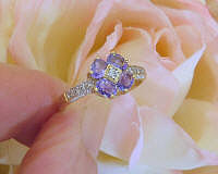 Natural Oval Tanzanite and Pave Diamond Flower Ring in 14k yellow gold