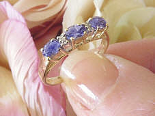 Stackable Oval East West Set Three Stone Real Tanzanite and Diamond Ring in 14k yellow gold for sale