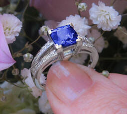 Natural Cushion Cut AAA  Tanzanite Fashion Ring with fine diamonds set in a 14k whiite gold split shank band for sale