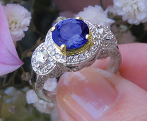 Buy a Vintage Style 7mm Round Cut Real Tanzanite Engagement Ring with Real Diamond Halo Ring in solid 14k white gold