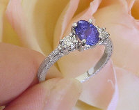 Oval Natural Tanzanite Three Stone Engagement Ring with Engraving in real 14k white gold for sale
