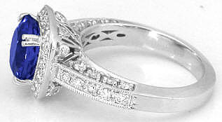 MJS Original Round Tanzanite and Diamond Halo Ring in 14k white gold