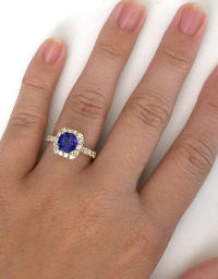 Cushion Tanzanite and Diamond Halo Ring in 14k yellow gold