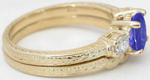 Past Present Future Oval Tanzanite Round Diamond Engagement Ring Set in 14k yellow gold