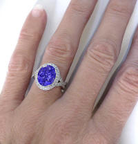 Unique oval tanzanite and diamond halo ring jewelry