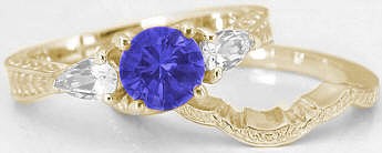 Tanzanite Three Stone Wedding Rings in 14k Yellow Gold