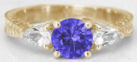 Tanzanite and White Sapphire Three Stone Rings in 14k Yellow Gold