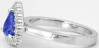 Trillion Cut Tanzanite and Diamond Halo Ring in 14k white gold