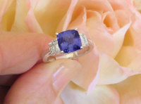 Cushion Cut Tanzanite and Baguette Diamond Engagement Rings