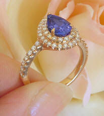 Large Pear Cut Tanzanite Ring in 18k Rose Gold with a Double Diamond Halo