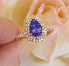 Natural Large Pear Cut Tanzanite Ring in 18k Rose Gold for sale