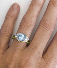 Three Stone Aquamarine Engagement Rings in 14k yellow gold