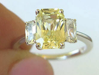 Radiant Cut Natural Yellow Sapphire Three Stone Ring with Radiant White Sapphire Side Stones set in solid 14k white gold