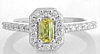 Natural Radiant cut bright yellow natural sapphire ring in a 14k white gold diamond halo design for sale