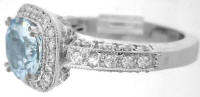 Genuine Round Aquamarine and Diamond Halo Engagement Rings