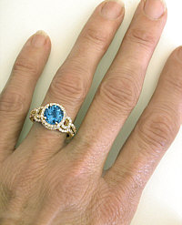Blue Topaz Engagement Ring in 14k yellow gold