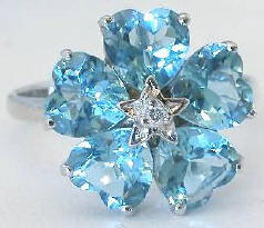 Blue Topaz Flower Ring with Heart Cut Gemstones in 14k white gold for sale