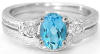 3 stone Blue Topaz and White Sapphire Engagement Ring