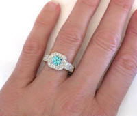 Blue Zircon and Diamond Halo Rings in 18k Gold