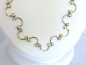 1.25 carat Natural Diamond Necklace in alternating 14k white and yellow gold for sale