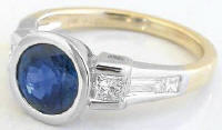September Birthstone Round Bezel Set Sapphire and Princess Baguette Diamond Ring in 18k