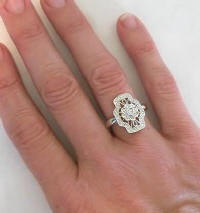 Vintage Style Diamond Ring in 18k white gold on the hand