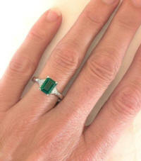 Three Stone Colombian Emerald Ring with Trillion Side Diamonds in 14k white gold