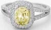 Yellow natural Sapphire and Diamond Ring in 18k white gold