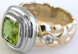 Bezel Set Peridot Ring in 14k yellow gold