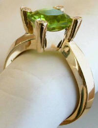 Cushion Cut Peridot and Diamond Rings in 14k yellow gold