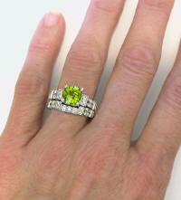 Marquise round peridot eternity ring in 14k white gold