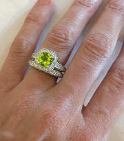 Cushion cut halo peridot band ring in 14k white gold